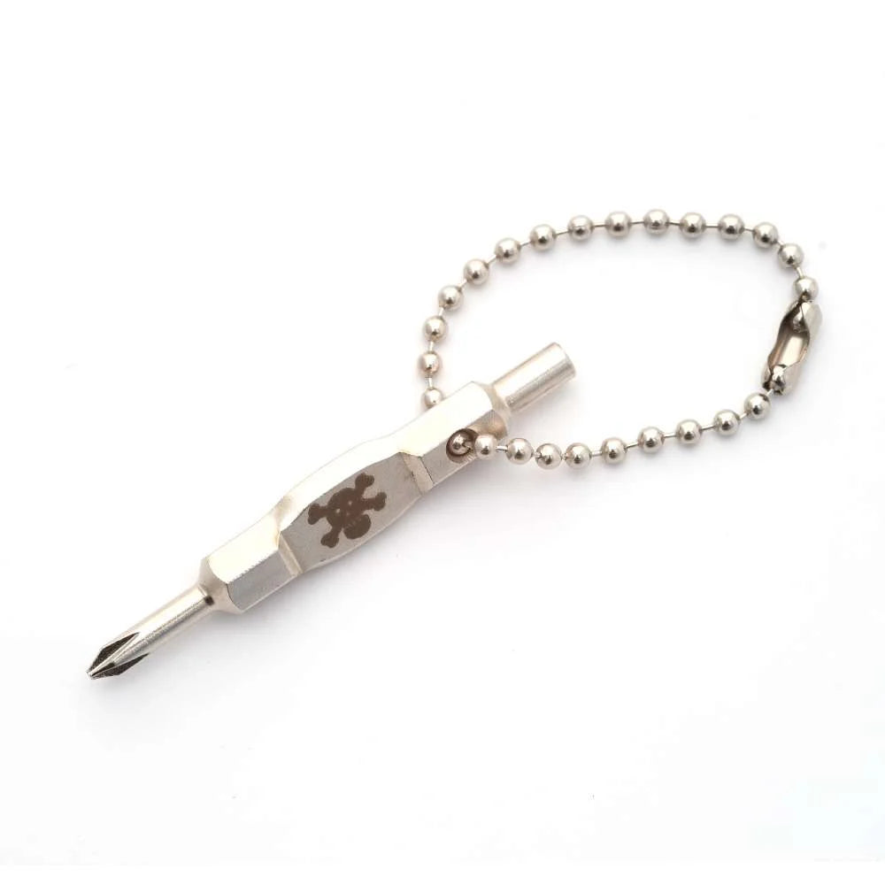 Blackriver Fingerboard Tool. The tool is silver with a skull and crossbones in the middle. The tool has a small keychain on one end and a screwdriver on the other.