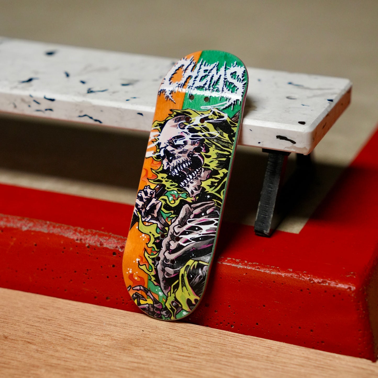 Chems “Green Fire Grim” (Orange/Green) Split Bottom Ply) Fingerboard Deck