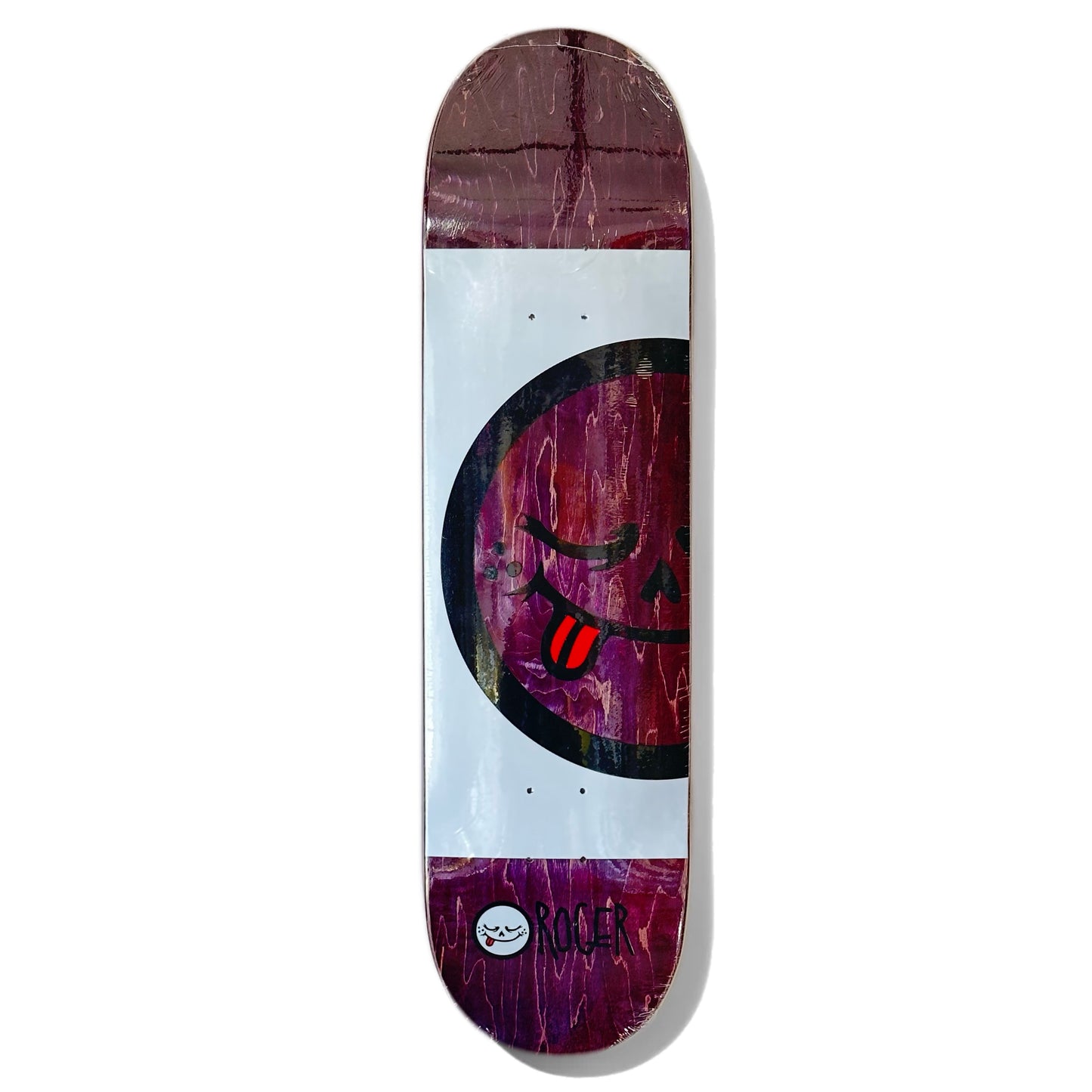 Roger Skate Co. Half Roger V3 Skateboard Deck; One red skateboard deck with dark purple background; ROGER logo and text at bottom; middle of board is white with illustrated graphic of large smiley face with tongue out