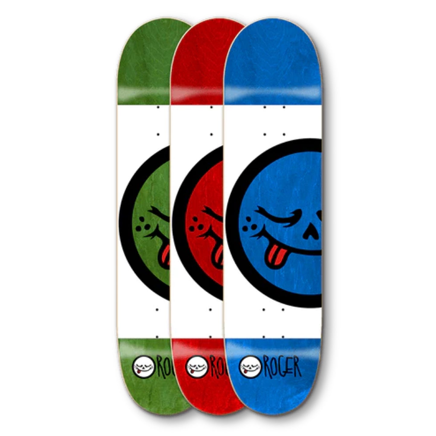 Roger Skate Co. Half Roger V3 Skateboard Decks; One red background skateboard deck; One green background skateboard deck; One blue background skateboard deck; All three decks feature ROGER logo and text at bottom; middle of board is white with illustrated graphic of large smiley face with tongue out
