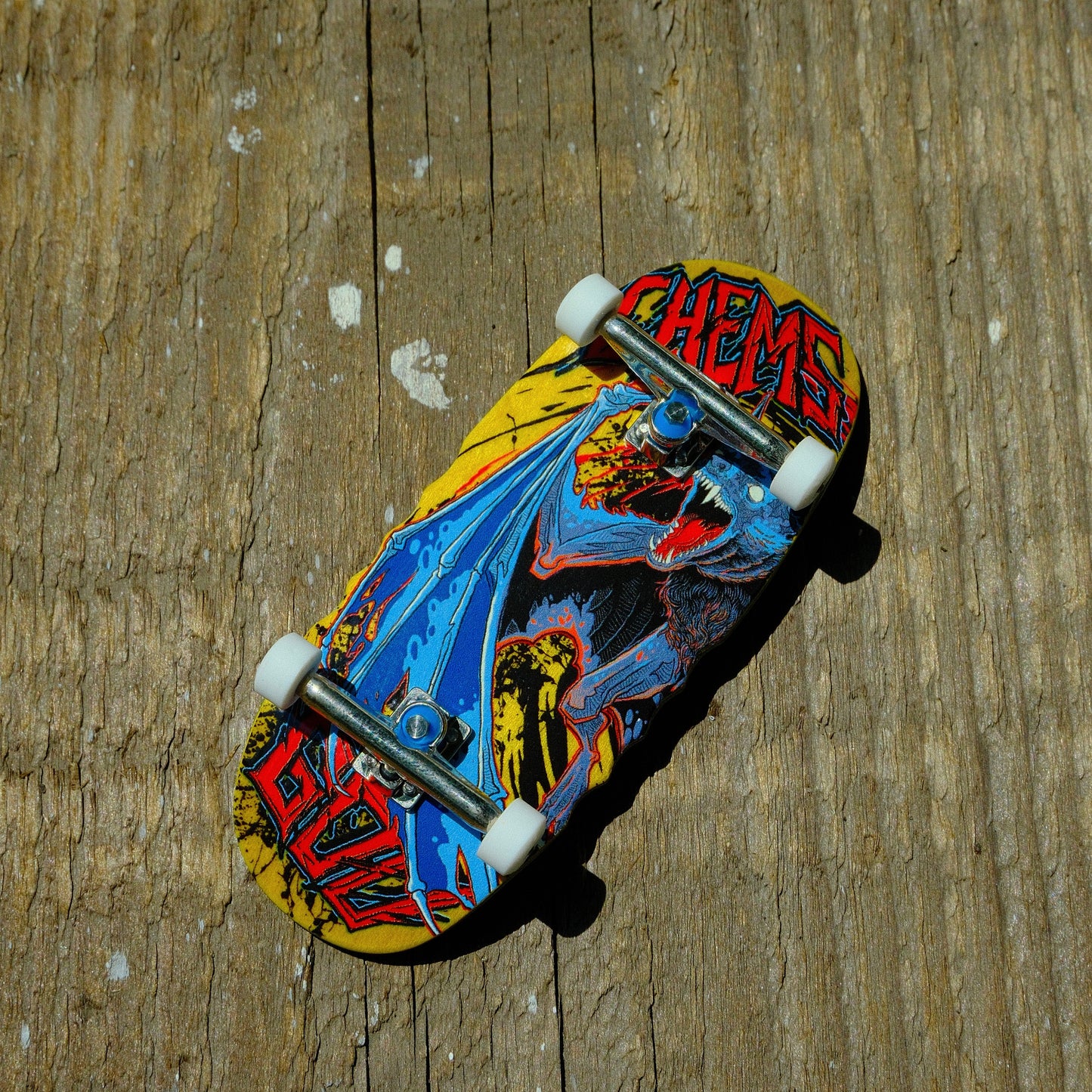 Chems 38mm Devil Egg Yellow Background Bat (GOO Collab) Fingerboard Complete (DELI)