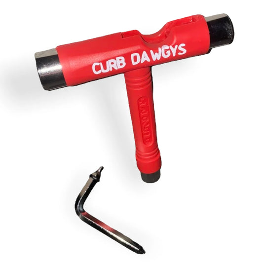 Red Curb Dawgys Skateboard Tool; White "CURB DAWGYS" text on the tool; Essential multi-functional tool for skateboard maintenance and adjustments; Compact and convenient design for on-the-go use;