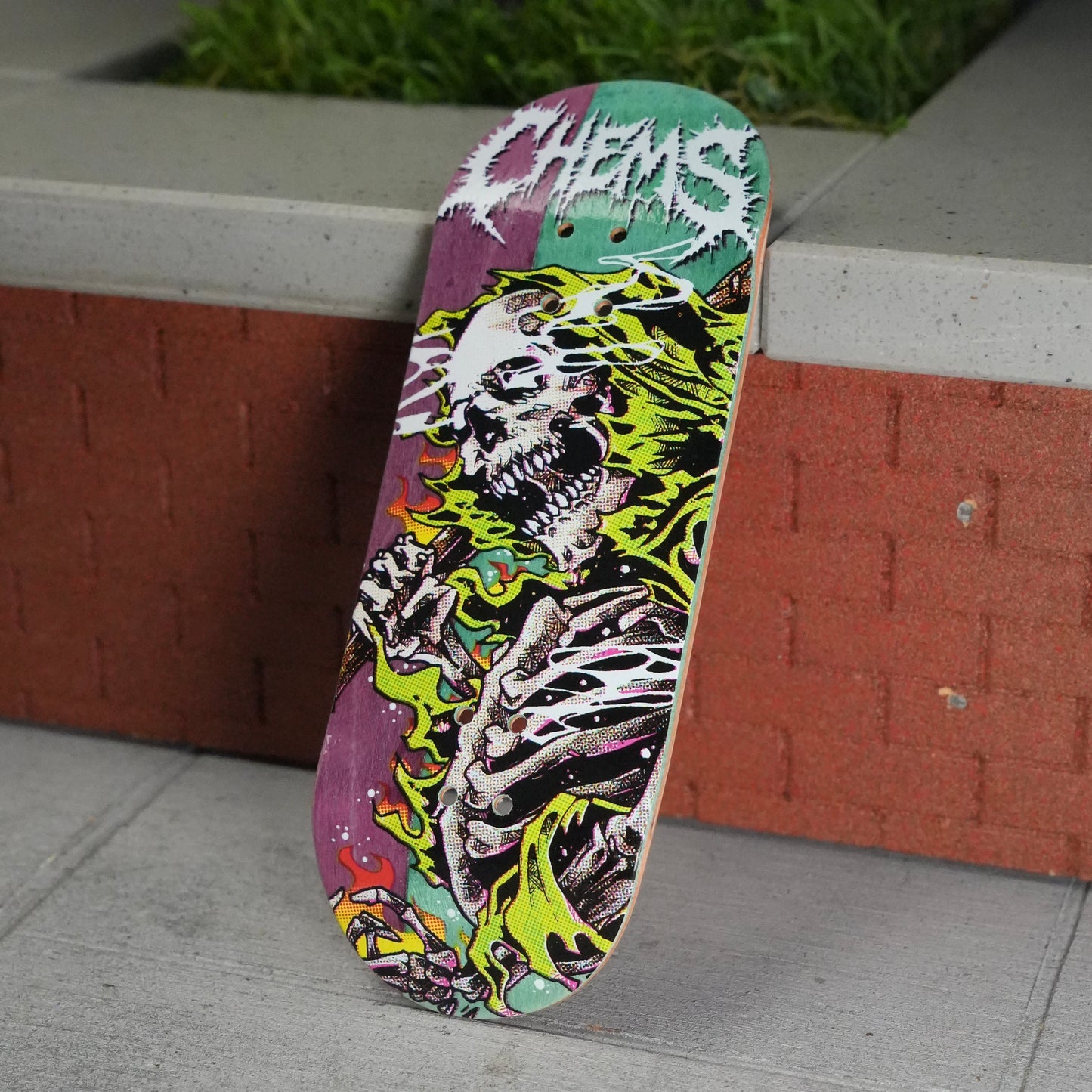 Chems “Green Fire Grim” (Purple/Green) Split Bottom Ply) Fingerboard Deck