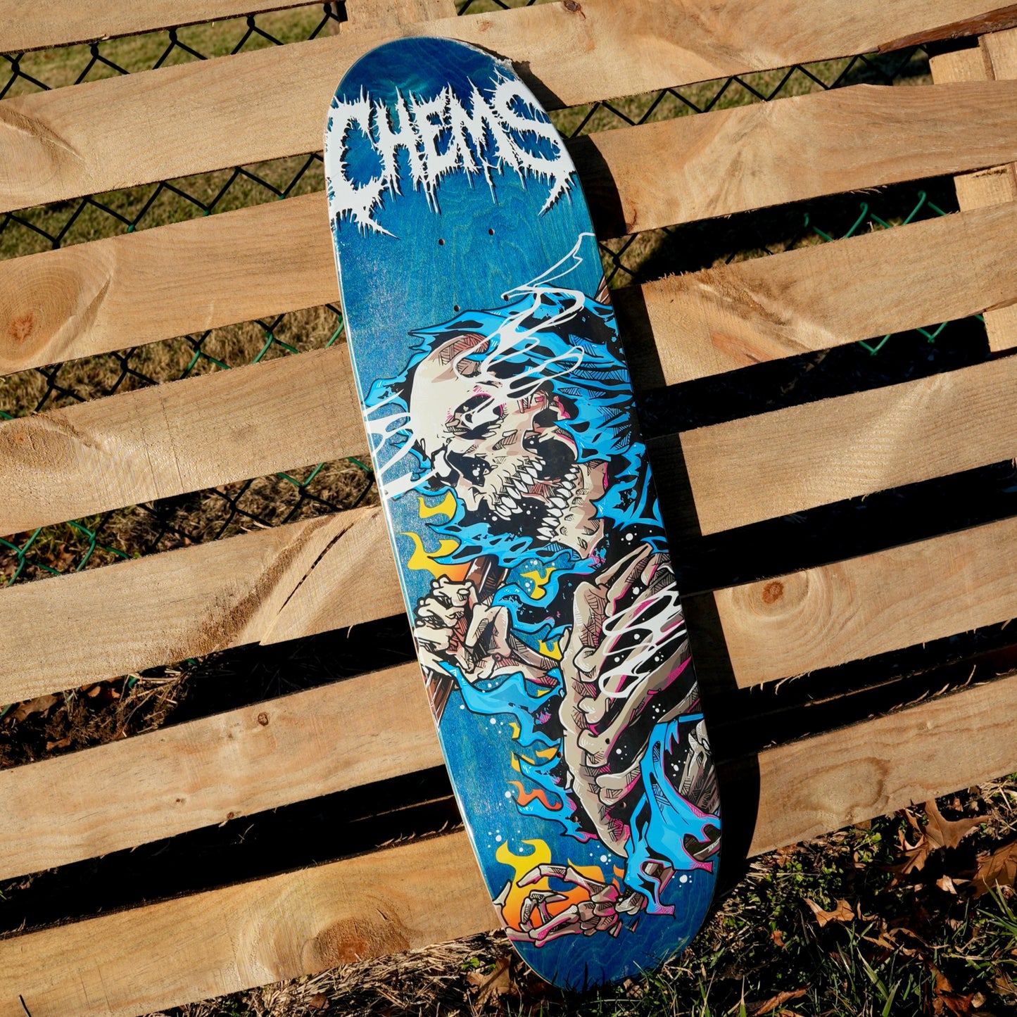 Chems Blue Fire Grim 8.75" Egg Shaped Skateboard Deck (Blue Bottom Ply)