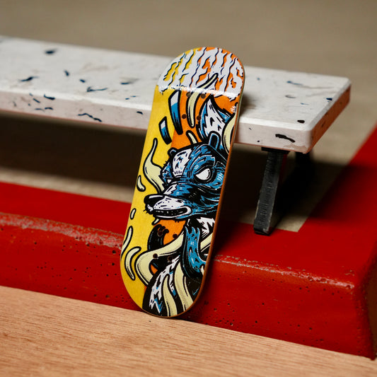 Chems “Scheming Skunk” (Yellow/Orange) Split Bottom Ply) Fingerboard Deck
