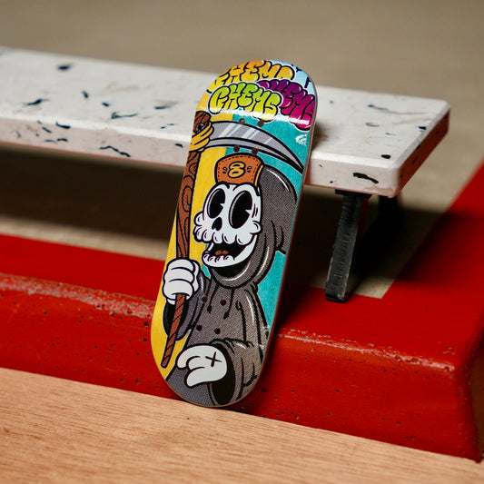 Chems “Gray Toon Grim” (Blue/Yellow) Split Bottom Ply) Fingerboard Deck