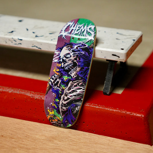 Chems “Purple Fire Grim” (Purple/Green) Split Bottom Ply) Fingerboard Deck
