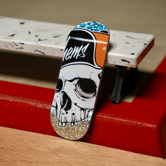 Chems “Big Skull Orange” (Glitter Foil) Fingerboard Deck