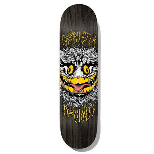 Grimple Stix Tony Trujillo Pro Model Skateboard; White illustrated furry monster with yellow eyes and teeth; Yellow letters spell "GRIMPLE STIX TRUJILLO"; Black background