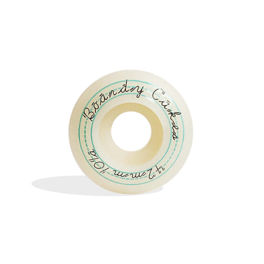 Boardy Cakes OG Skateboard Wheels; White wheels with black text over blue dotted guidelines; Features the phrase "Boardy Cakes 42mm 101a";