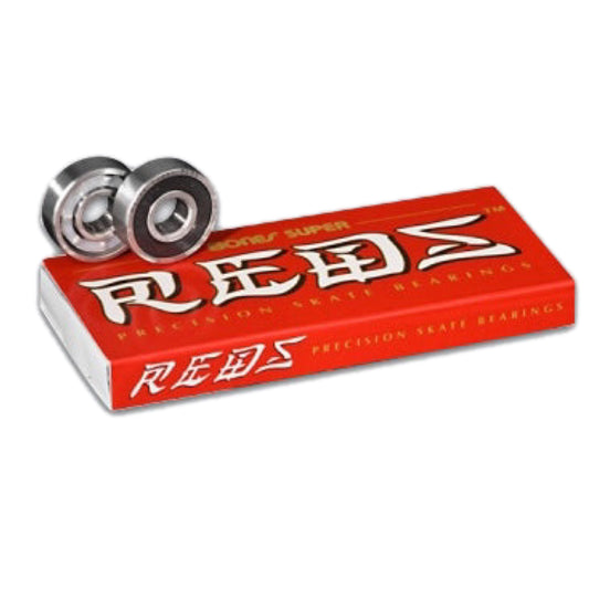 Bones Super Reds Skateboard Bearings; Silver bearings with clear and black shields for added durability; Red package with white and gold text; Known for their high-speed performance and smooth roll;