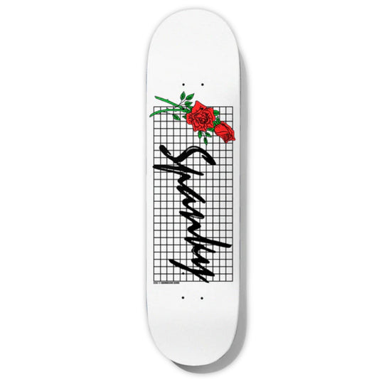 Baker Spanky Roses Skateboard Deck; White background; Black cursive lettering spells out “Spanky” over black grid background; Graphic illustration of red roses next to the lettering