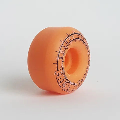 Orange Boardy Cakes Therm O Thane Heat Shift Skateboard Wheels; Therm O Thane technology for color change with heat; Unique and eye-catching design; Provides reliable grip and speed; Enhances skateboard style and performance.