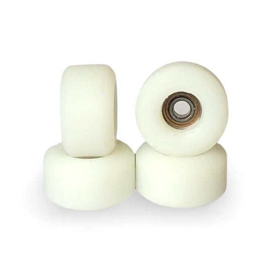 White PIRO Fingerboard Wheels; Crafted from high-quality urethane material; Designed specifically for optimal performance during fingerboarding; Provides a smooth and consistent ride; Enhances grip and control for executing tricks and maneuvers with precision.